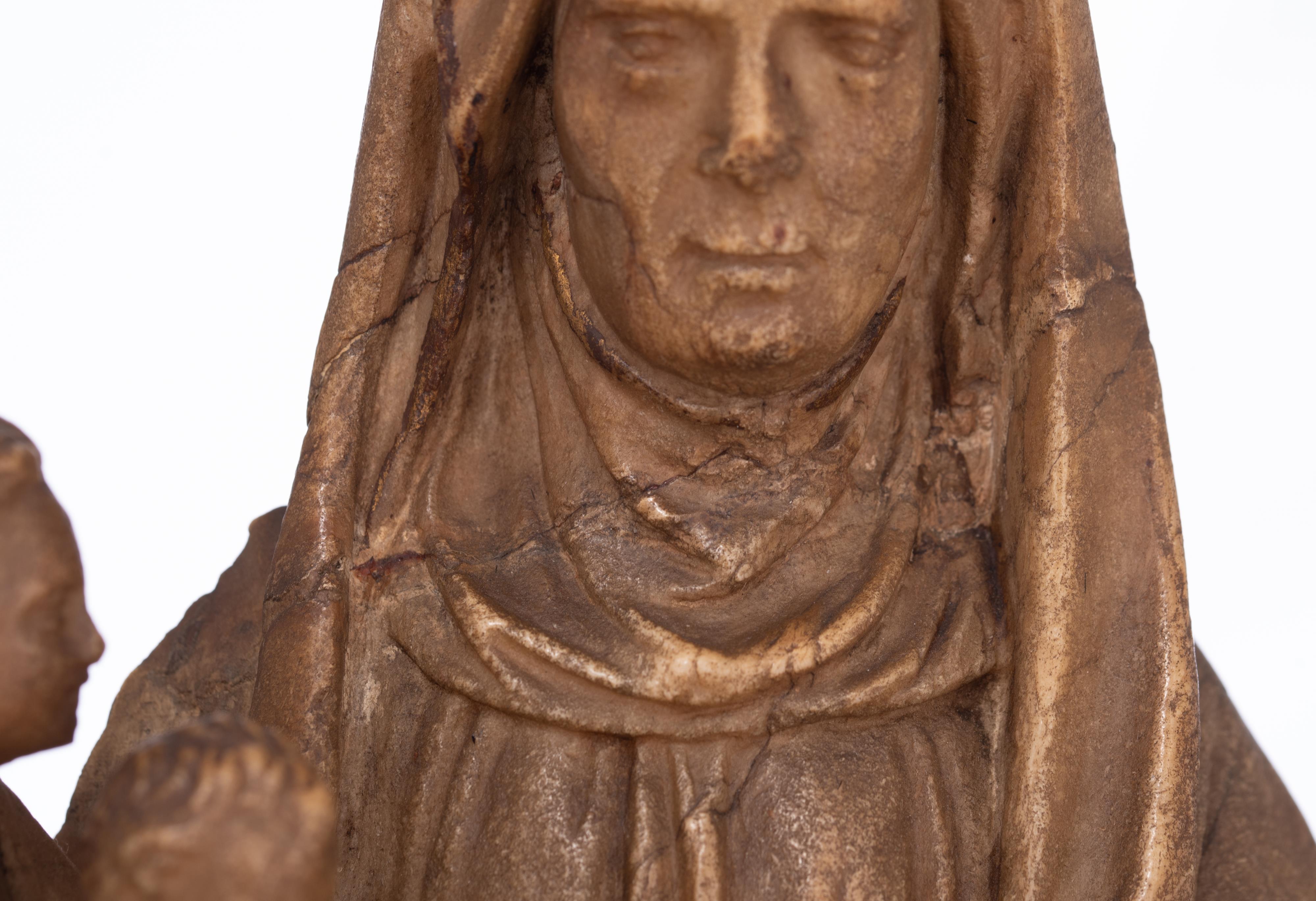 An alabaster Saint Anne with the Virgin and Child, 16thC, the Southern Netherlands, H 42 cm - Bild 10 aus 11