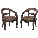 A near pair of Renaissance style richly carved oak tub chairs, 19thC, H 80 - W 63 cm