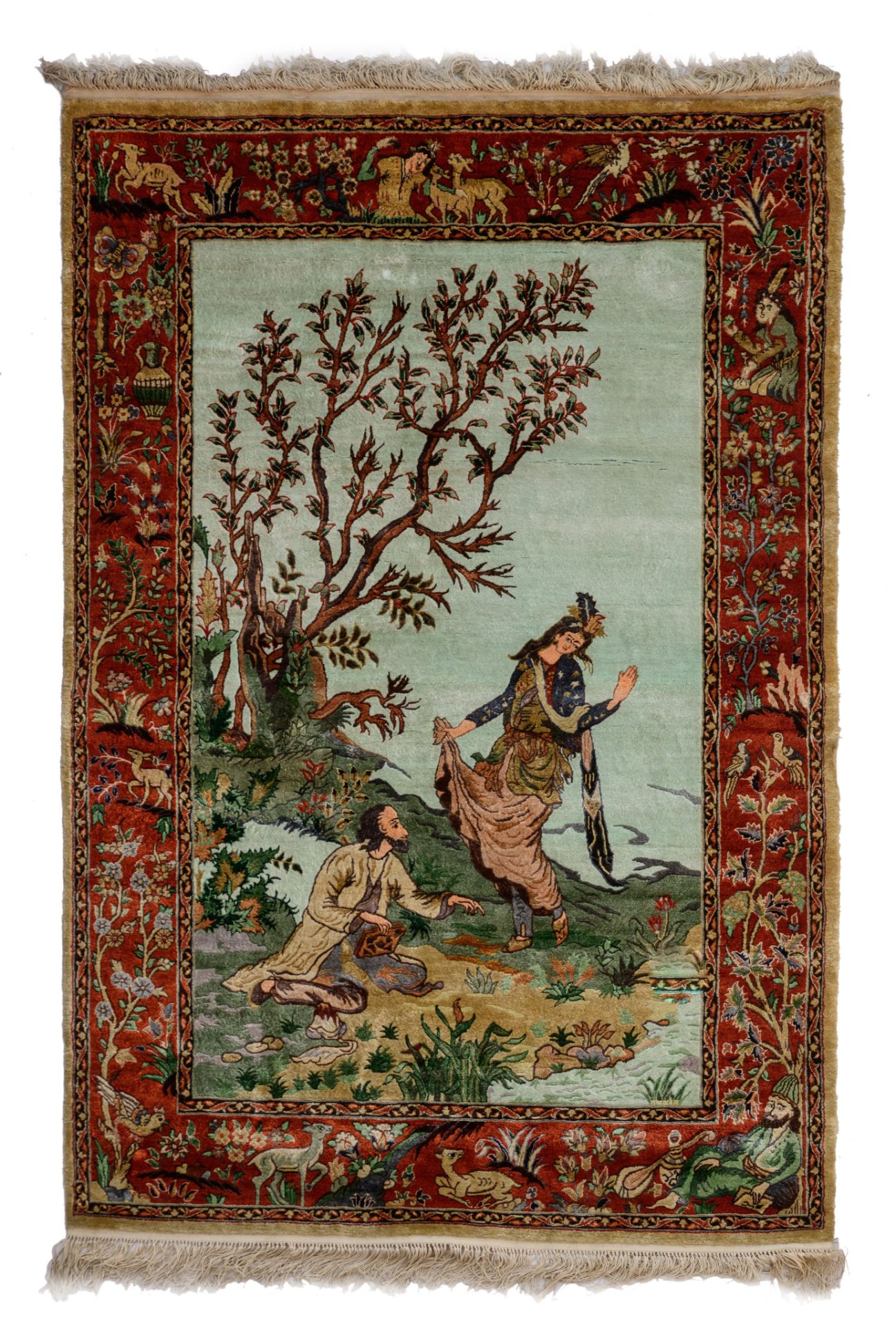 An Oriental carpet, decorated with figures in a landscape, wool on wool, 156 x 109 cm