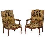 A pair of French Régènce style walnut armchairs, H 103 - W 69 cm