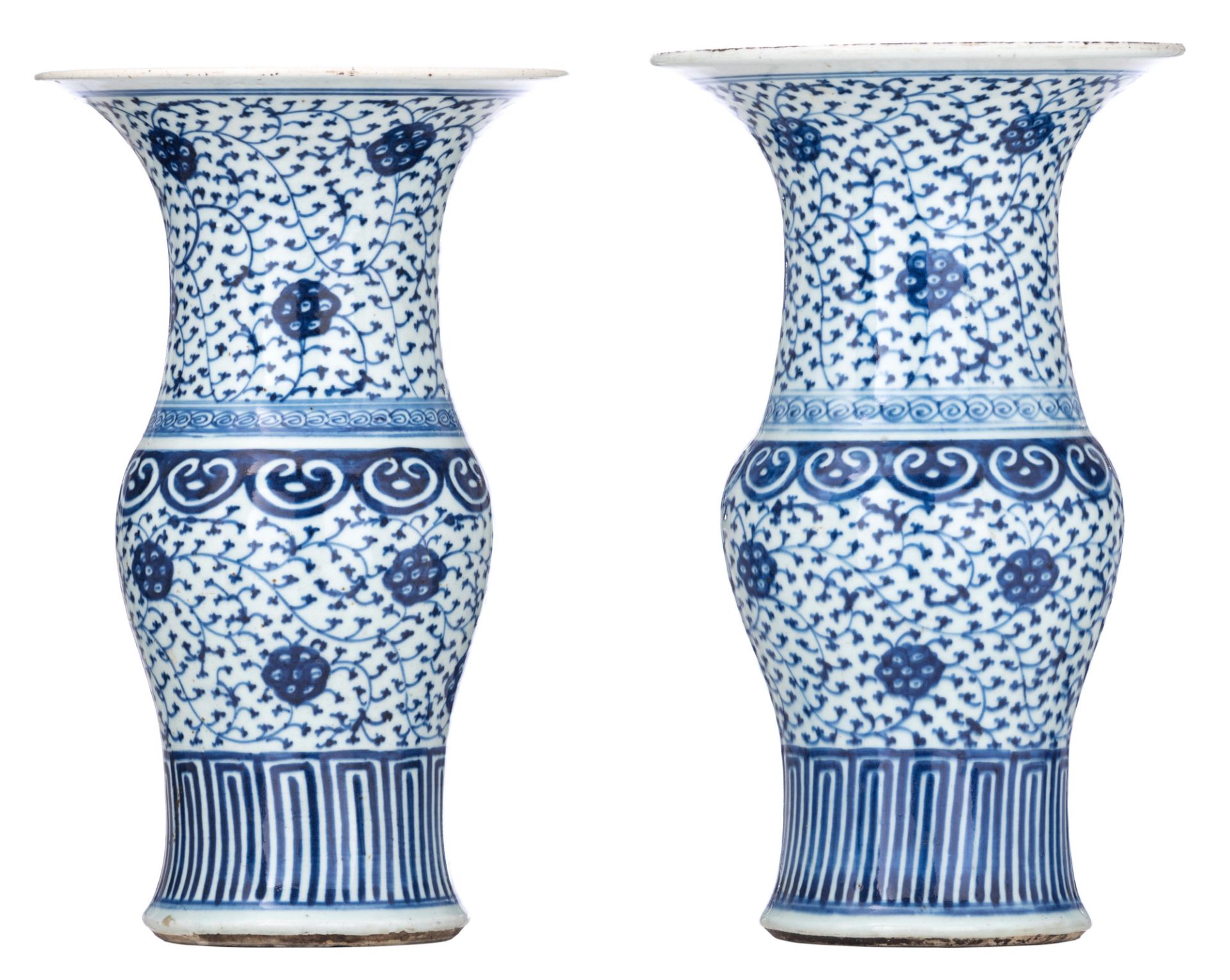 A pair of Chinese blue and white 'scrolling lotus' yenyen vases, 19thC, H 40 cm
