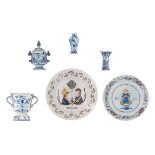 A collection of blue and white and polychrome decorated Delftware items