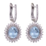 A pair of 18ct white gold earrings set with aquamarine and 64 brilliant-cut diamonds, total weight: