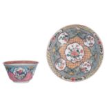 A set of Chinese famille rose 'peony' cup and saucer, Yongzheng period, ø 10,8 cm