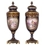 A fine pair of Sèvres porcelain covered vases, signed and marked, H 53,5 cm