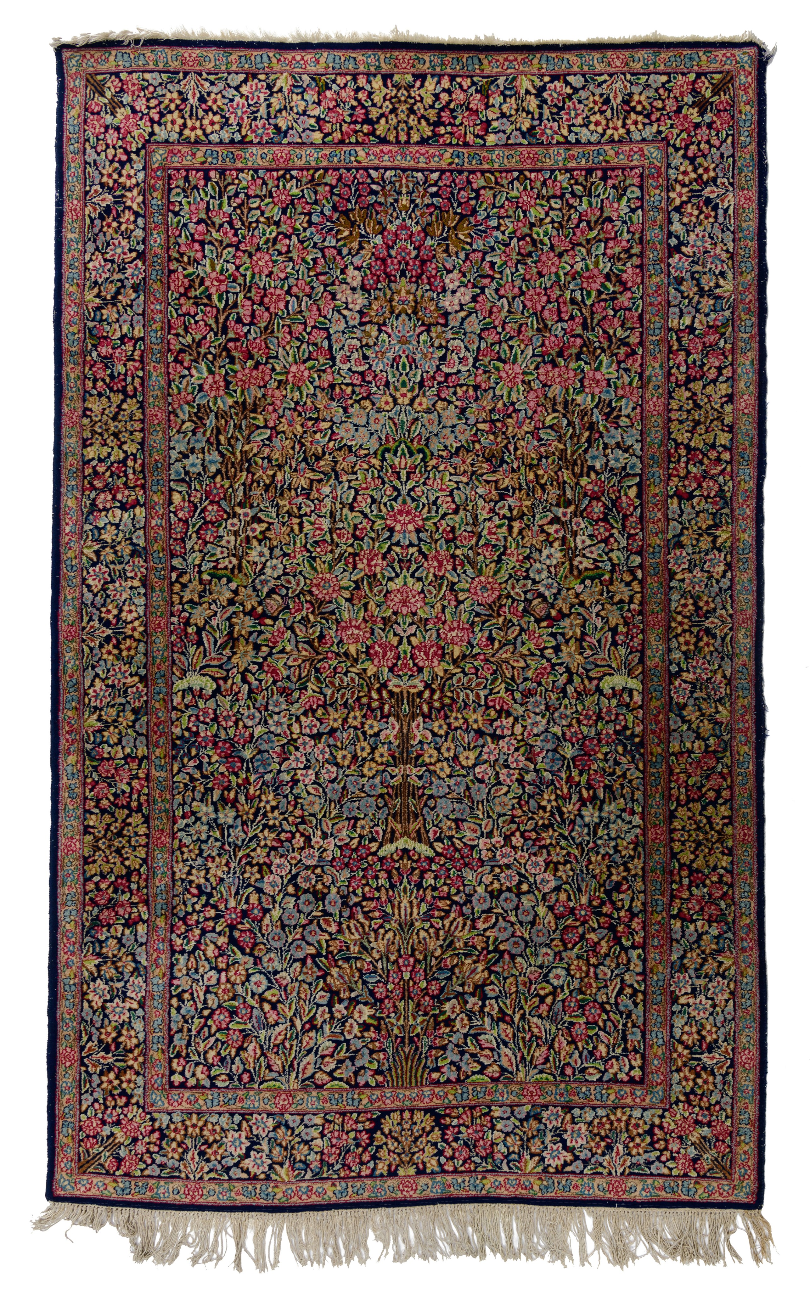 An Oriental Kirman woollen rug, floral decorated, 151 x 244 cm