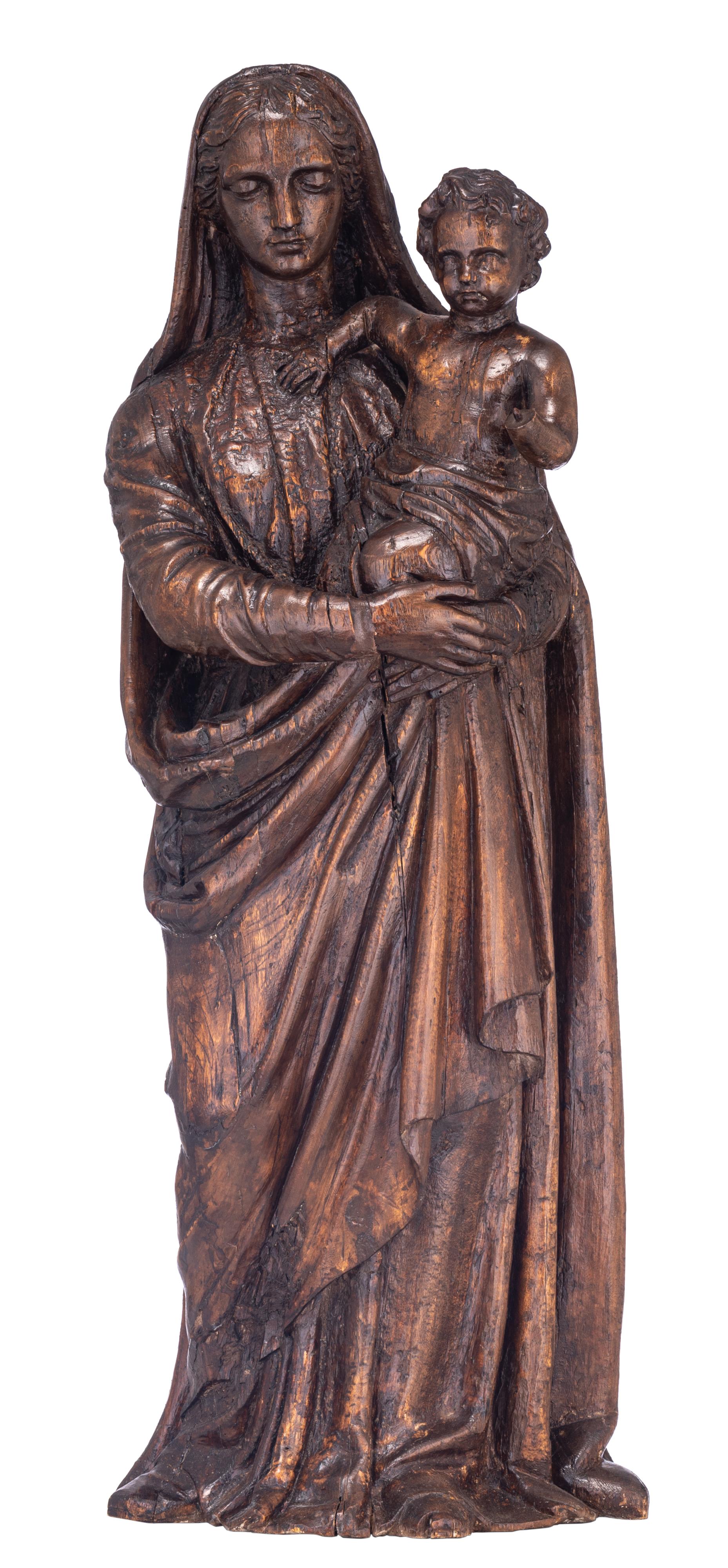 An imposing sculpture of the Madonna holding the Holy Child in her arms, 17thC, H 97,5 cm