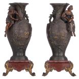 A pair of patinated spelter vases with pastoral scenes, signed Moreau, H 51,5 cm