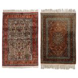 Two Oriental rugs, 122 x 179,5 / 123,5 x 177 cm