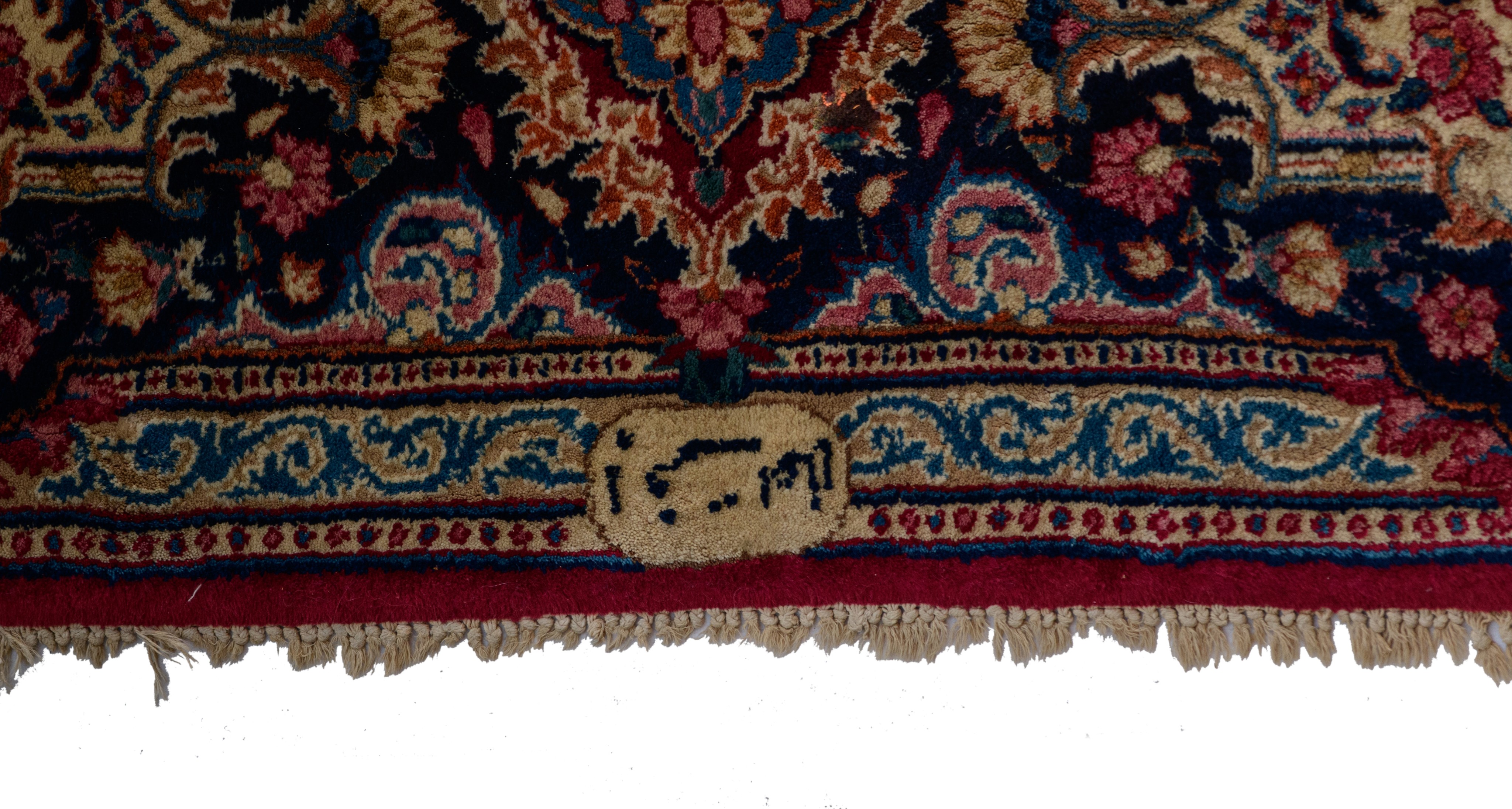 A large Oriental woollen rug, floral decorated, signed, 360 x 260 cm - Image 4 of 9
