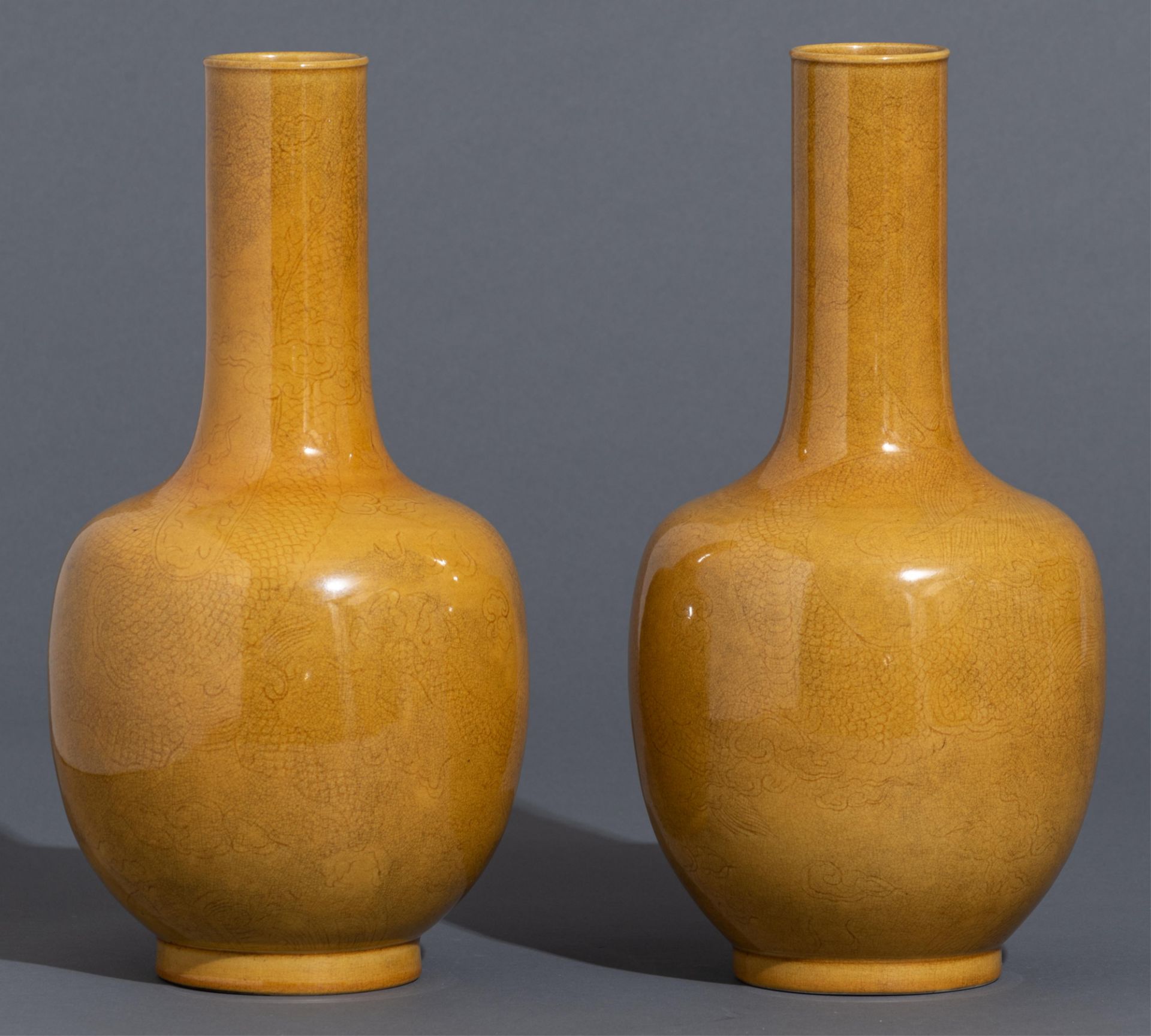 A pair of Chinese incised yellow-glazed 'Dragon' bottle vases, H 33,5 cm - Image 5 of 11