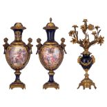 A pair of Sèvres vases and a matching candelabra, H 54,5 - 58,5 cm