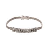 An 18ct white gold bracelet set with 24 brilliant-cut diamonds, L 15,5 cm, the total weight 9,7 g