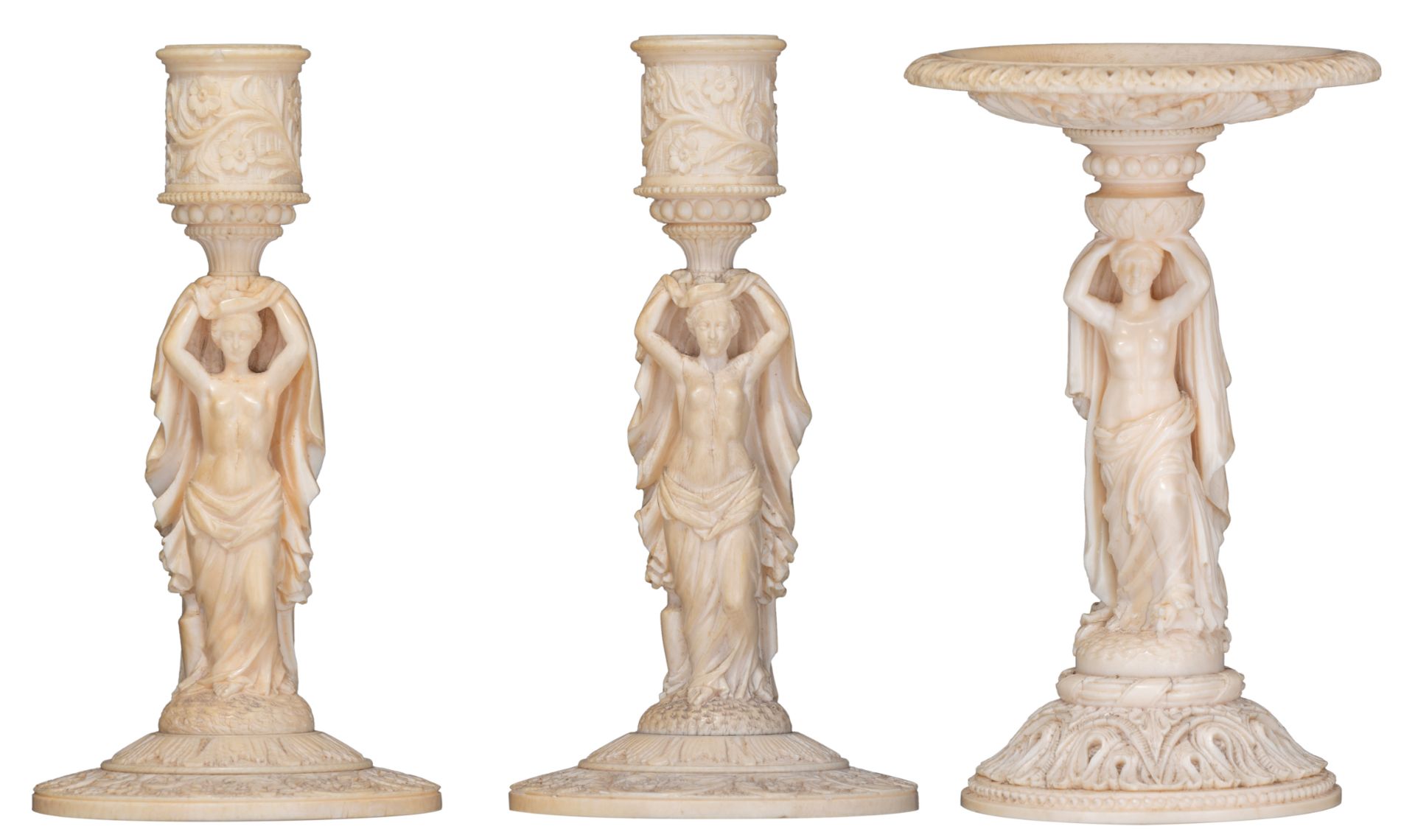 A pair of 19thC Dieppe or Paris ivory candlesticks and a ditto tazza, H 17,2 - 17,4 cm