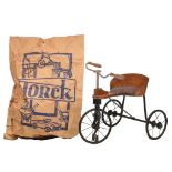 A rare Torck tricycle in metal, wood and leather, 1927, 55,5 x 56 x 65 cm