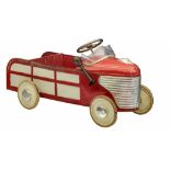 A Torck 'Stationwagon' cream and red metal pedal car, with adjustable backrest, 1950 - 1959, 51 x 49