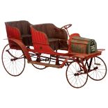 A rare deluxe edition pre-war Puls-Bovie red wooden duo seat pedal car, ca 1905-1910, 82 x 66,5 x 16