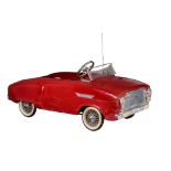 A Torck luxurious 'Spider 4' red metal pedal car, with a working music box and lights, 1959, 44,5 x