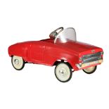 A Torck 'Junior' red metal pedal car, 1959-1961, 44,5 x 49 x 88 cm