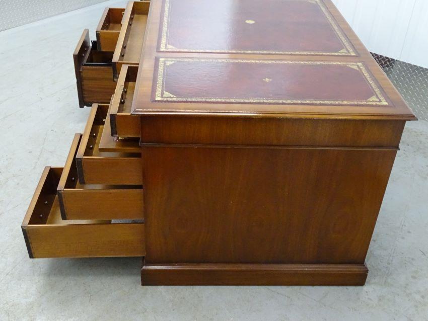 Partners Desk - a 20th C mahogany pedestal desk with gold tooled red leather inserts to top, with - Image 4 of 8