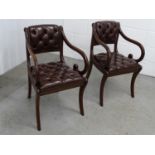 Pair of scroll open arm leather chairs - 2 late 20 th C Regency style sabre leg Sang de Beouf