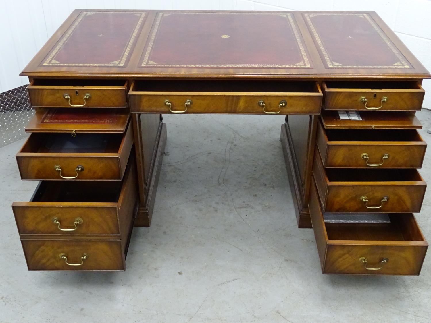 Partners Desk - a 20th C mahogany pedestal desk with gold tooled red leather inserts to top, with - Image 3 of 8