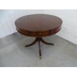 Drum Table - a 20 th C mahogany 4 drawer ( each 11 1/3? wide) with reeded 4 spoked base and brass