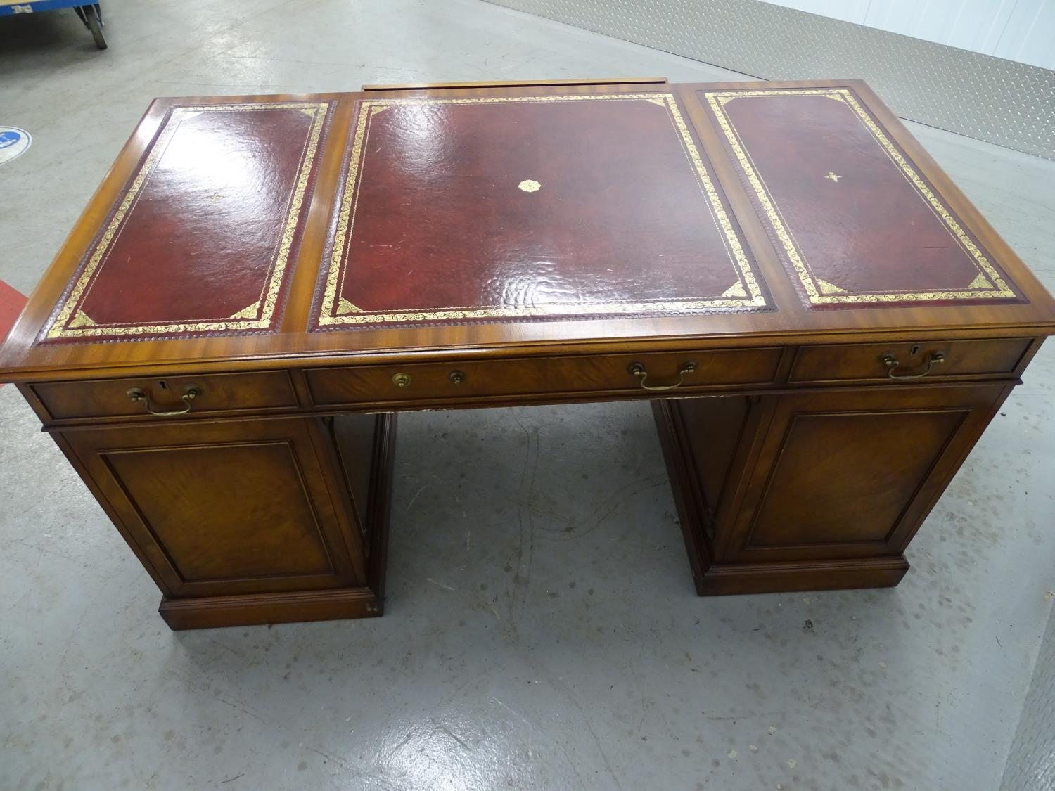 Partners Desk - a 20th C mahogany pedestal desk with gold tooled red leather inserts to top, with - Image 6 of 8