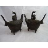 Pair of Chinese Incense burners - a pair of four footed elliptical shaped lidded incense burners