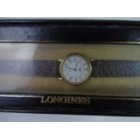 Longines Watch : a ladies Roman 153 6950 Quartz 18 Carat gold Plated Wrist Watch with 3/4? white