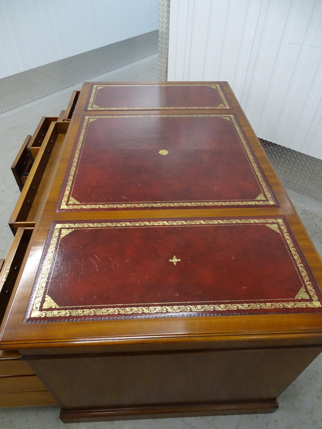 Partners Desk - a 20th C mahogany pedestal desk with gold tooled red leather inserts to top, with - Image 8 of 8