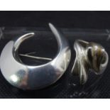 Danish Silver brooch : a ?Georg Jensen? silver Crescent Brooch, designed as an asymmetric crescent