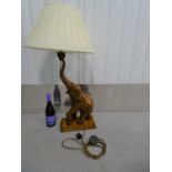 Elephant Table Lamp - a carved indian hardwood figure standing with it?s trunk held high ( good Feng