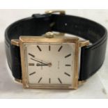 Gold Omega Gents Wrist Watch - a 9ct (0.375 marked ) De Ville, square cased, mechanical, silver