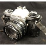 Photography Pentax ME - a Pentax ME manual focus 35 Mm SLR camera with a Abahi lined case and with a