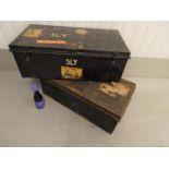 Travelling trunks - a pair of japanned metal travelling trunks for John Sly bearing travel labels