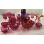 19 thC Cranberry glass : a collection of 16 items to include 2 salts with clear wavy rims, 2 heart