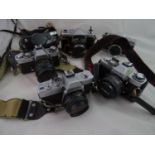 Photography - various cameras including : The Kowa H, a 35 mm SLR with a fixed lens and leaf