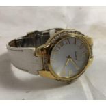 Ladies Citizen Wrist Watch - a gold plated ? Eco-Drive ? circular white dial watch with faux
