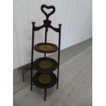 Art Nouveau - a circa 1900 American Black Walnut 3-tier circular Cake Stand with 3 turned supports