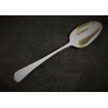 Georgian Marked Silver : a bright cut decorated spoon with ornate worn monogram, maker George