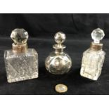 Silver and glass scent bottles : a continental pierced Rococo cover clear glass and white metal