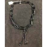 Whitby Jet Necklace : a late Victorian facet cut necklace , 24 3/4 in / 62.8 cm
