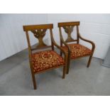 A pair of Walnut Continental open armchairs -two cloth covered overstuffed walnut (20 th C)chairs