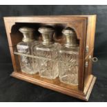 Rosewood and Silver Tantalus - a Continental .800 silver , Rosewood and Amboyna 3 bottle