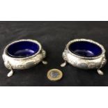 Pair of circular cruets : a pair of Martin Hall & Co, Sheffield electroplate silver ornate