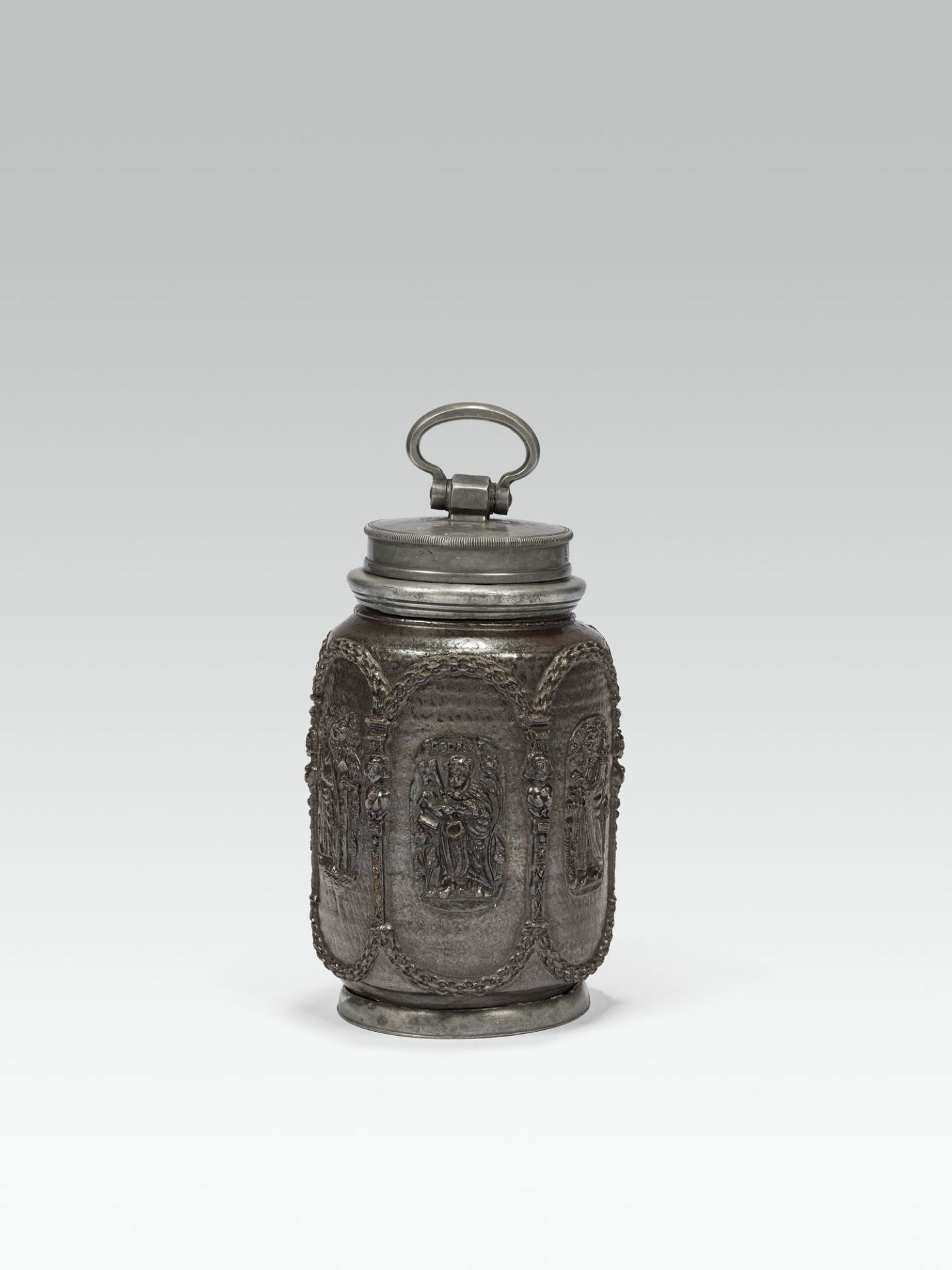 Large bottlestoneware, glazed; cylindrical walling with relief décor; inscribed: "PEDRUS", "S.