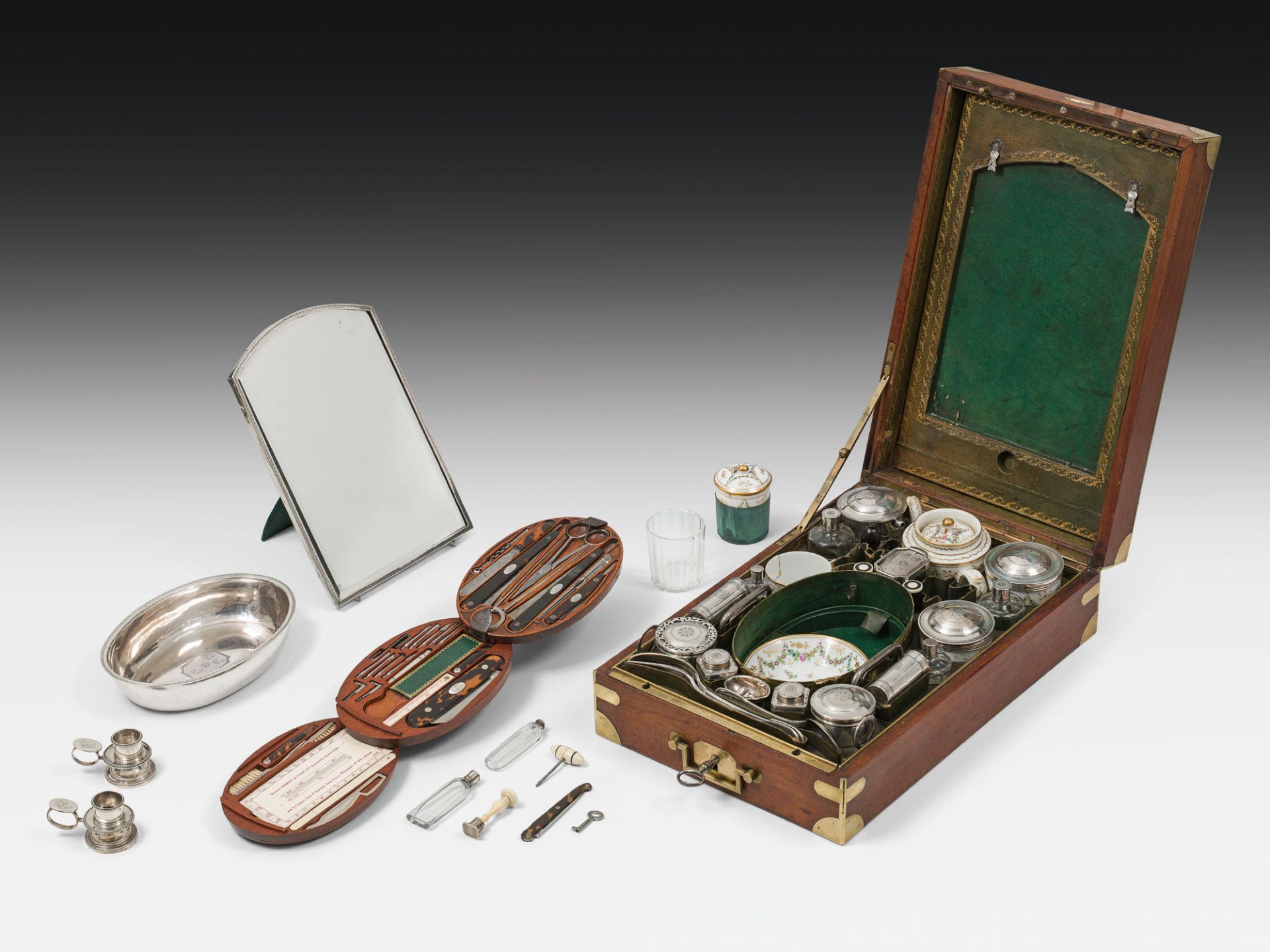 Travel kitsilver, porcelain, glass, wood, leather; individual pieces partly marked, inscribed and