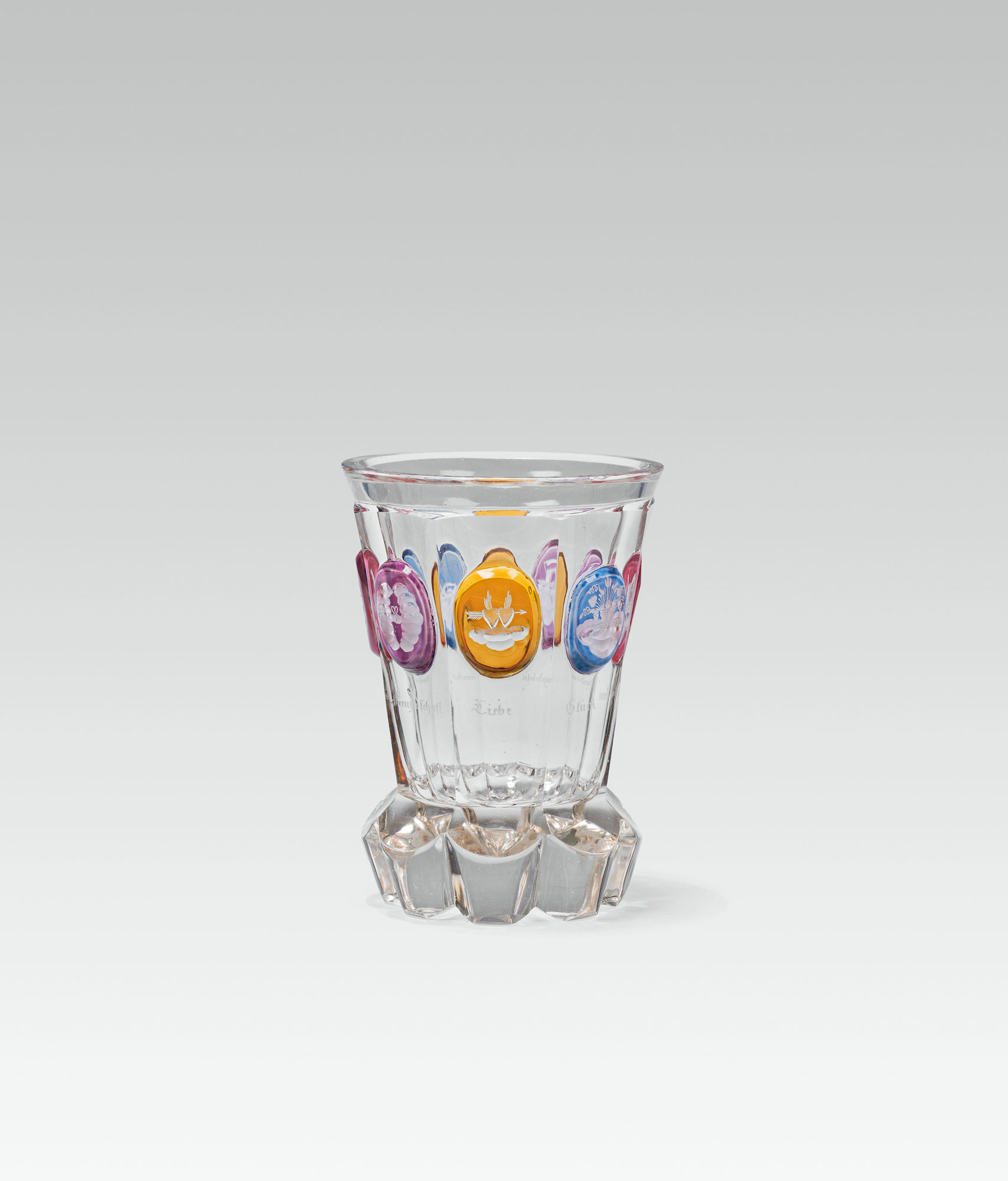 Friedrich EgermannBeakercolourless glass; faceted walling; colourful medallions with symbols,