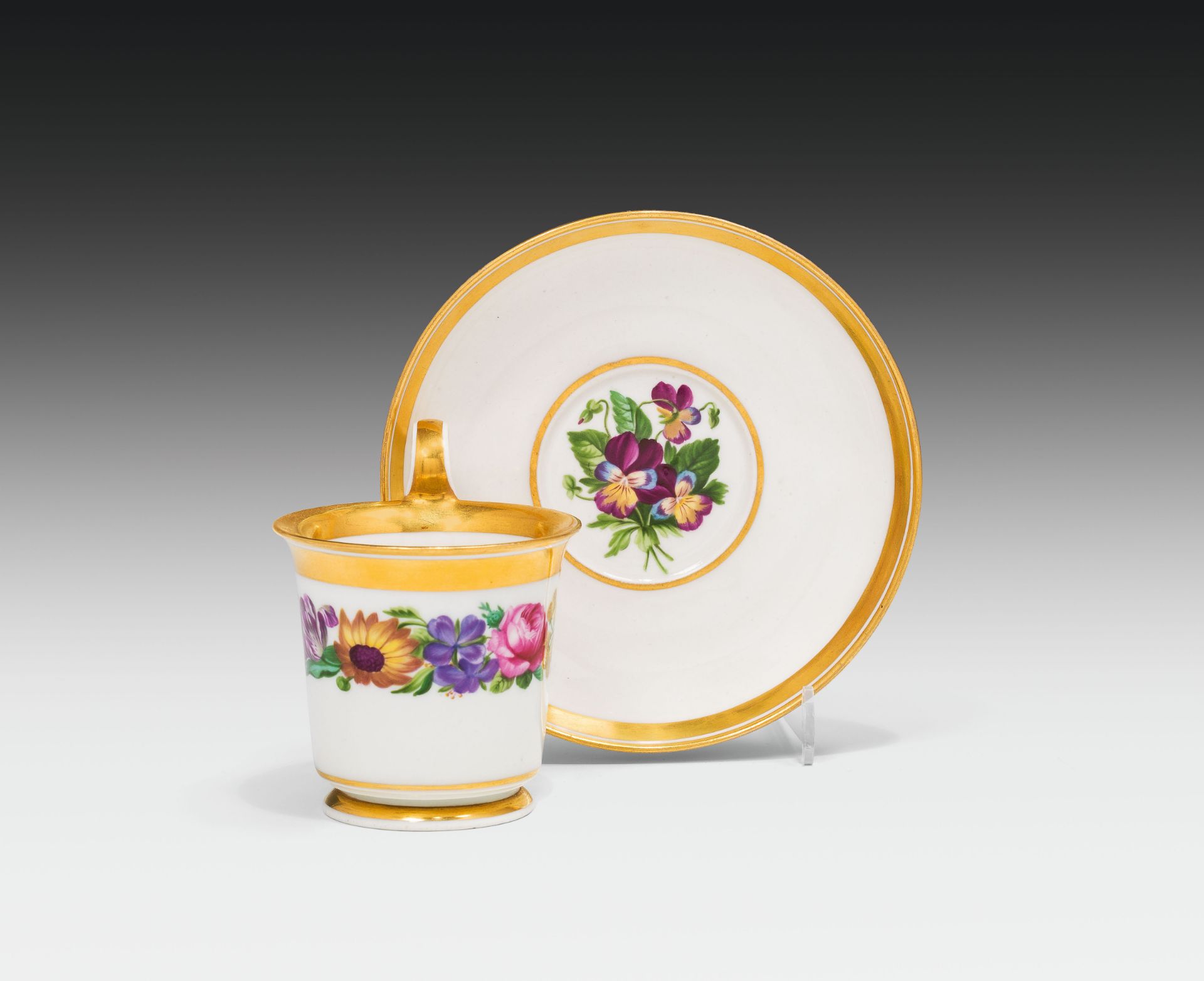 Cup and saucerporcelain, colourfully painted and glazed, partly gilded; inscribed on the bottom: "